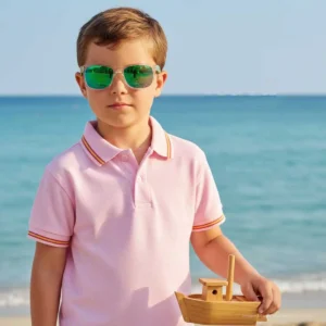 Polo niño rosa con bandera de España y detalles en cuello y mangas