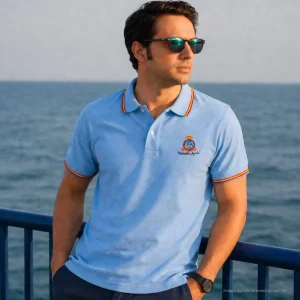 polo patrulla aguila celeste hombre con bandera de España en cuello y mangas
