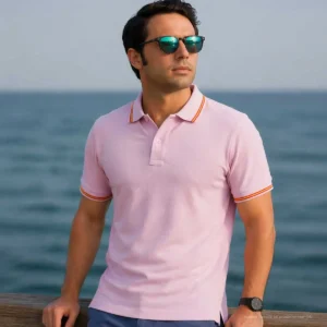 polo rosa hombre con bandera de España en cuello y mangas